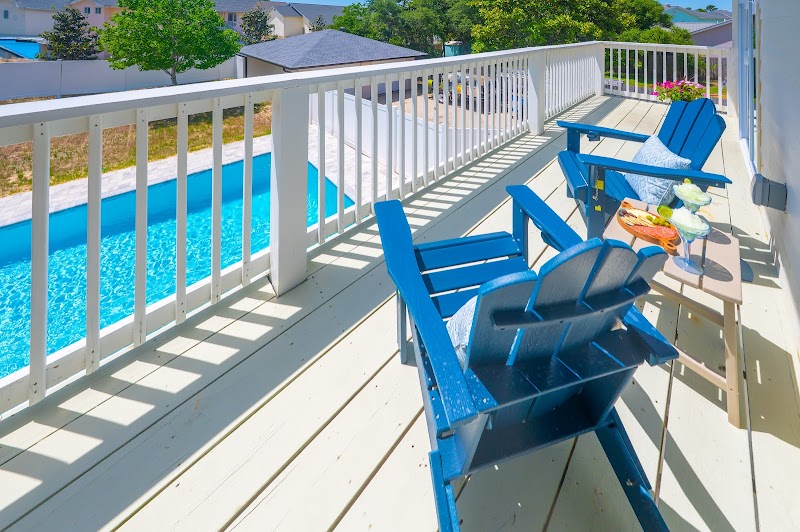 Balcony view from Tropical Tides at Sundial Suites overlooking the pool