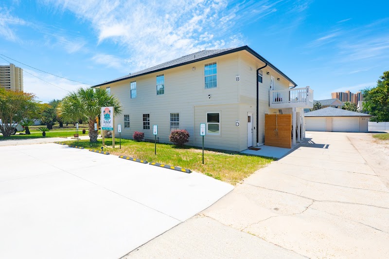 Side view of Sundial Suites and pool deck Panama City Beach