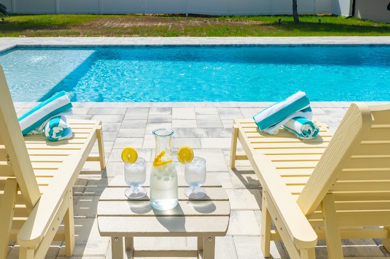 Pool and palm trees at Sundial Suites in Panama City Beach