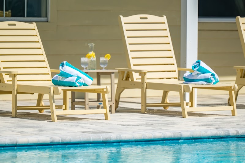Pool and palm trees at Sundial Suites in Panama City Beach