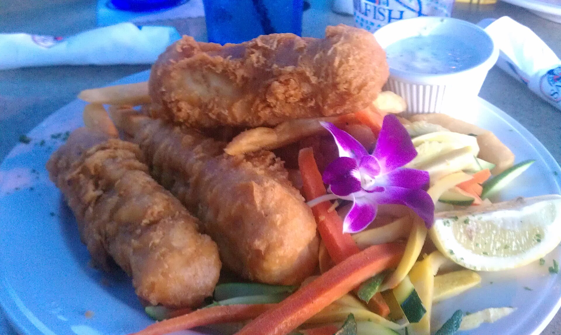 Seafood at a marina-side restaurant — representative photo